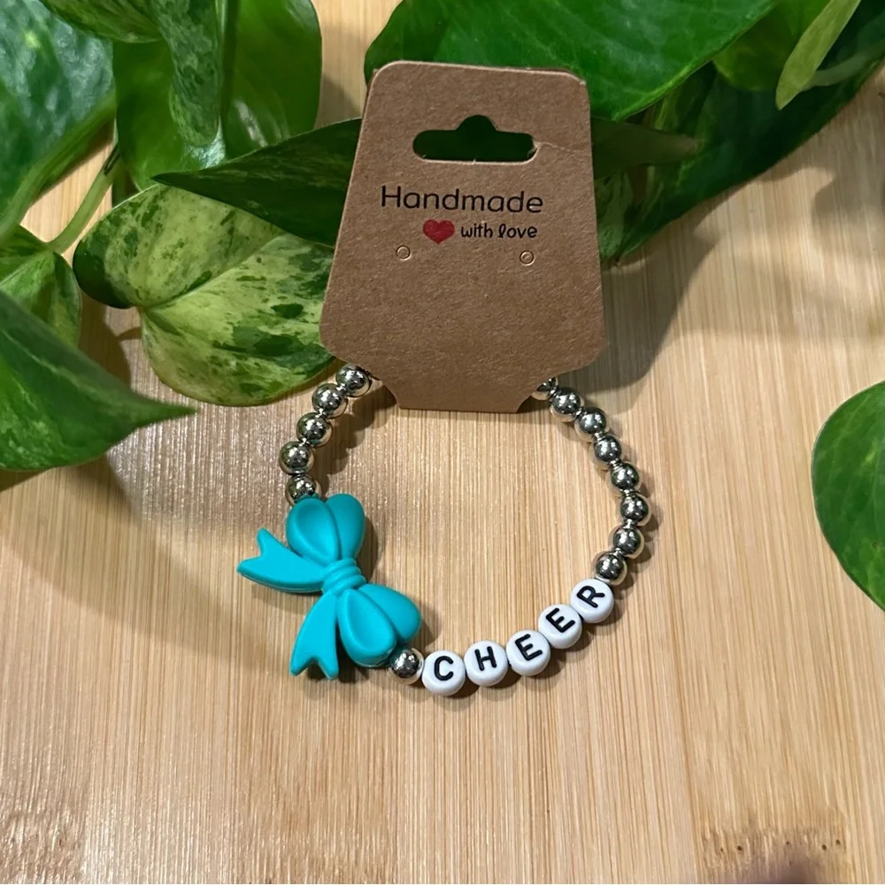 Silver Kids’ Stretchy Beaded Cheer Bracelet | Handmade | Silicone Bow 📣✨